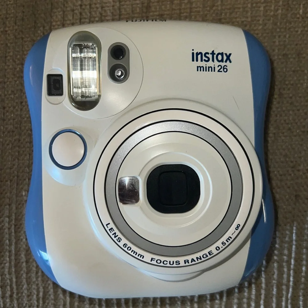 Fuji Film Instax camera with accessories